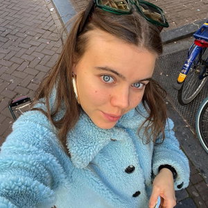 Lucca, Hondenoppas in Amsterdam