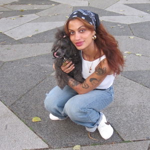 Naomi, Hondenoppas in Amsterdam